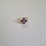 Amethyst and diamond clover with four oval leaves in 9kt gold