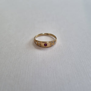 
                
                    Load image into Gallery viewer, Ruby and diamond 7 stone band ring 18kt
                
            