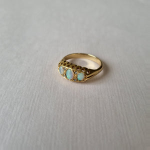 
                
                    Load image into Gallery viewer, Opal boat ring inter spaced by tiny diamonds
                
            