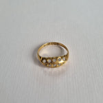 18kt gold boat ring set with 5 rosecut diamonds