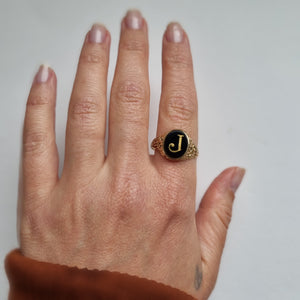 Onyx letter "J" signet ring in 9kt gold