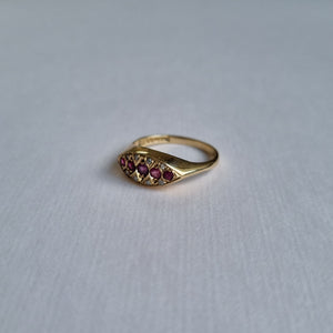 9kt marquise shaped oblong ruby and diamond ring