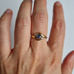 Antique sapphire and diamond ring in 18kt gold crossover setting