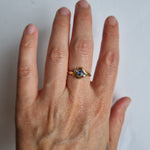Antique sapphire and diamond ring in 18kt gold crossover setting