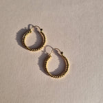 Round tightly twisted hoop earrings in 9kt gold