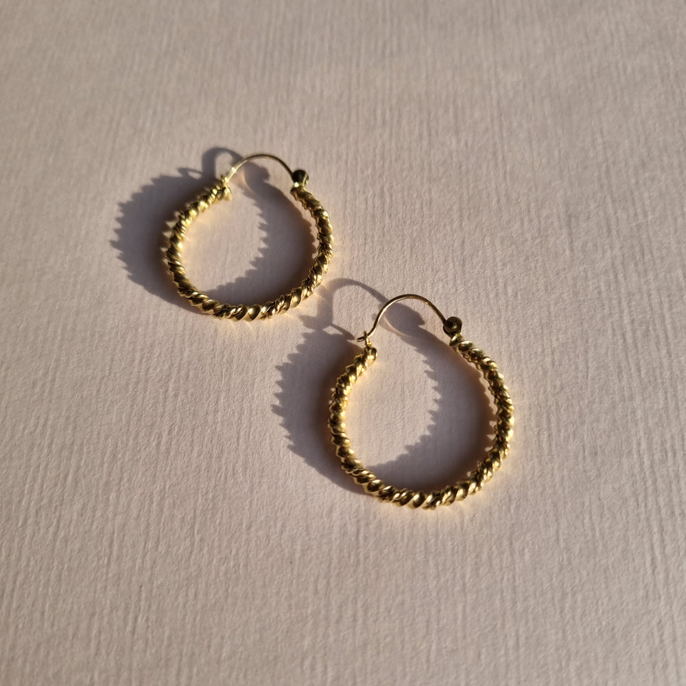 Round tightly twisted hoop earrings in 9kt gold