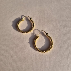 
                
                    Load image into Gallery viewer, Round tightly twisted hoop earrings in 9kt gold
                
            
