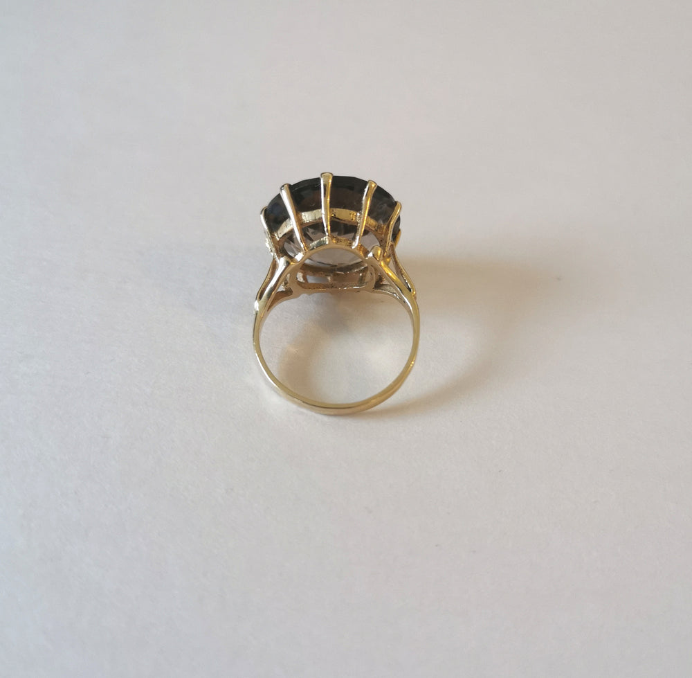 
                
                    Load image into Gallery viewer, Bold round-cut smokey quartz in 9kt gold claw setting
                
            