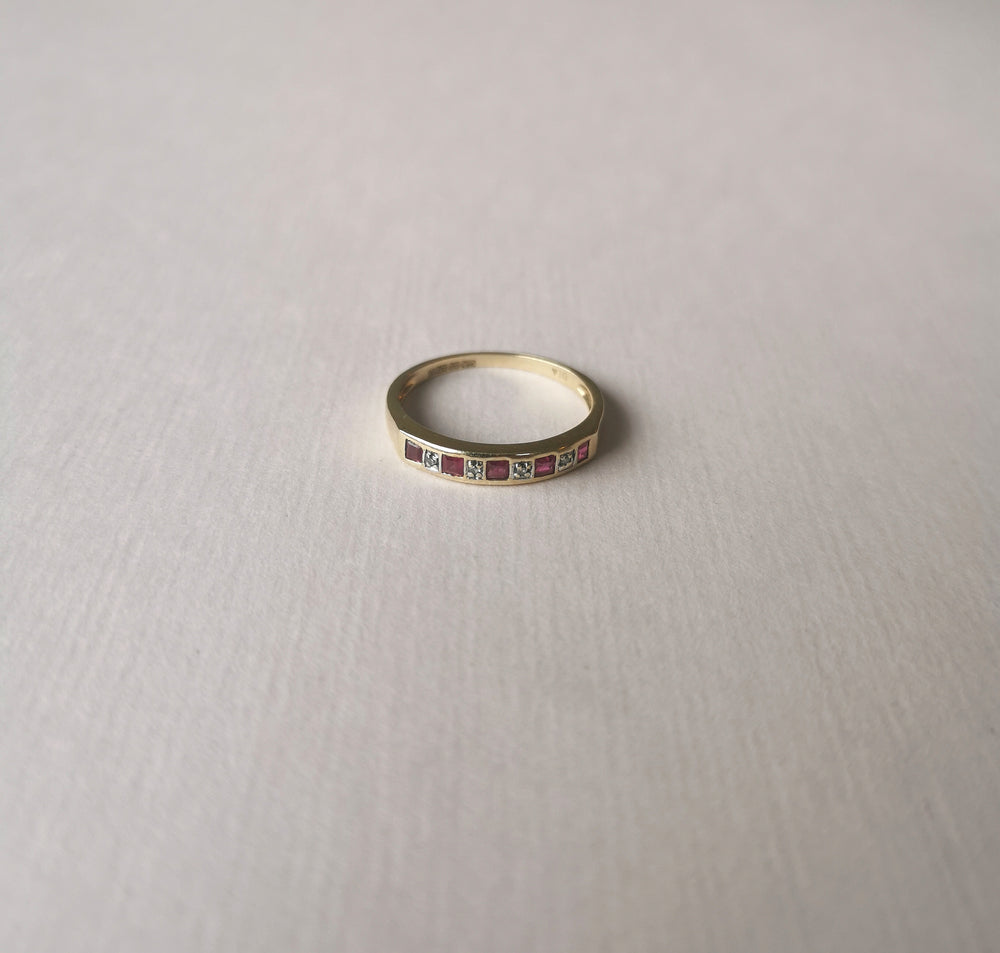 
                
                    Load image into Gallery viewer, 9kt gold half band with 5 square ruby and 4 round-cut diamonds
                
            